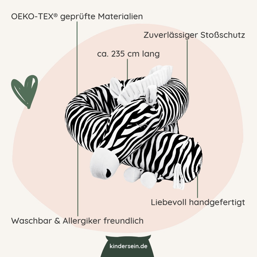Weiche Bettschlange Zora das Zebra, 235 cm lang, handgefertigt, waschbar, mit allergikerfreundlicher Füllung und zuverlässigem Stoßschutz.