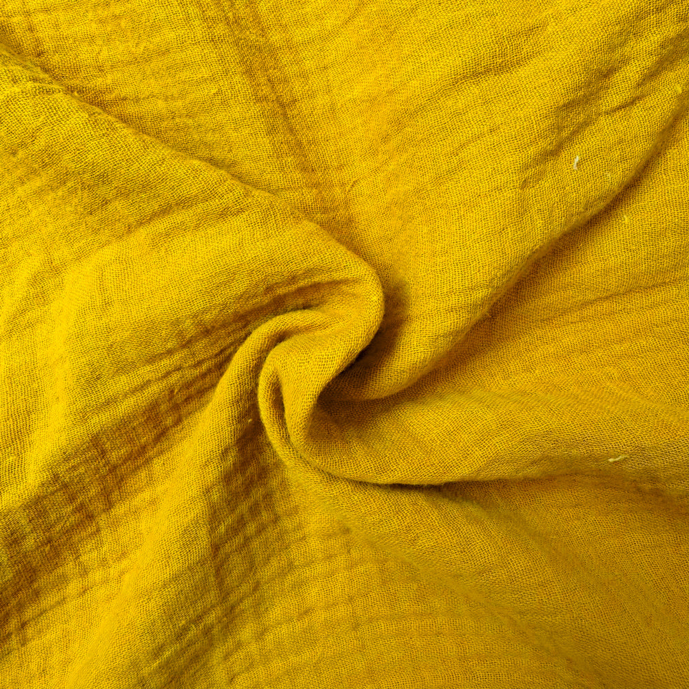 Weicher gelber Musselin aus 100% Baumwolle, atmungsaktiv und OEKO-TEX® zertifiziert, ideal für Hausbett-Himmel im Kinderzimmer.