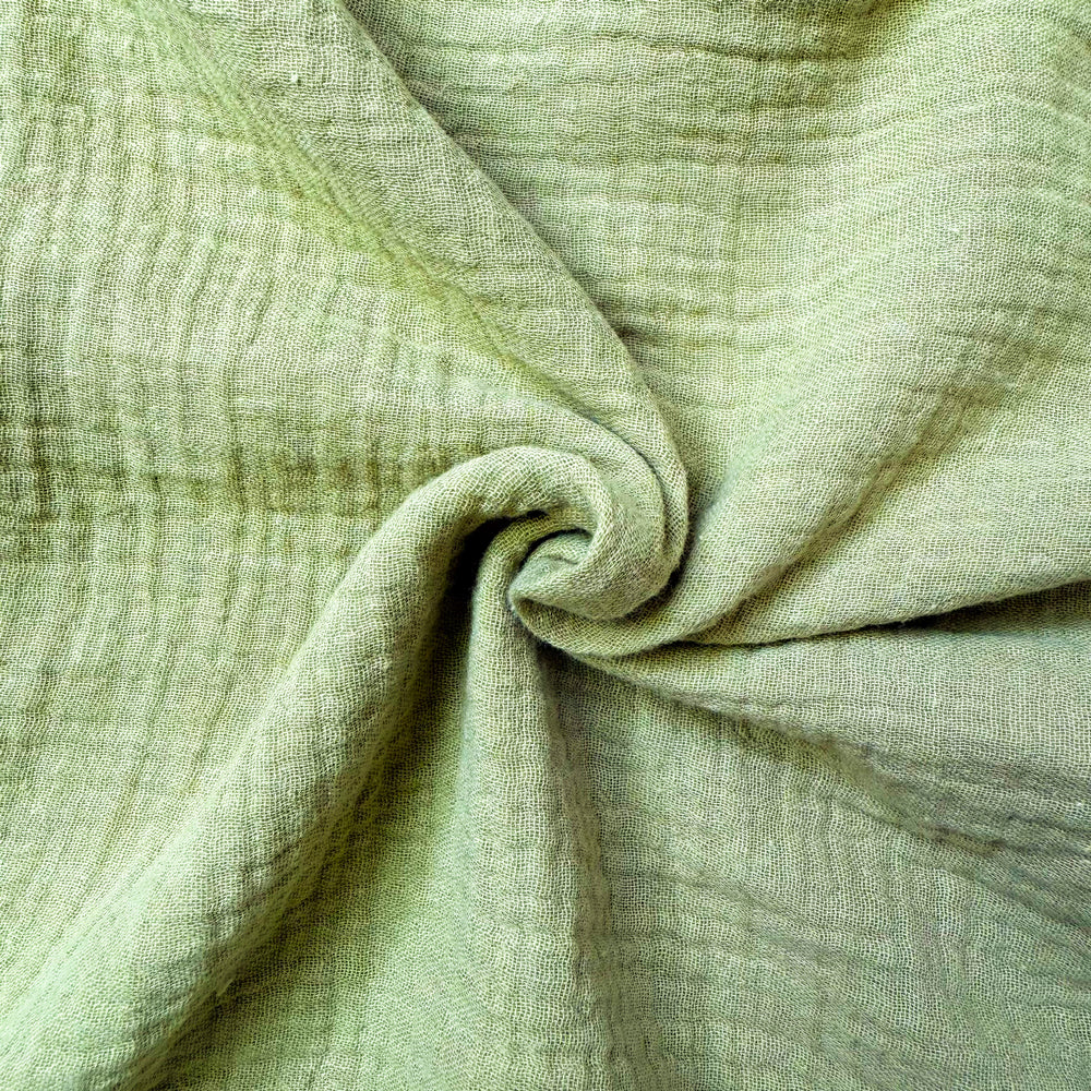 Weicher, atmungsaktiver Baumwoll-Musselin in hellem Grün, perfekt für Hausbett-Himmel im Kinderzimmer.