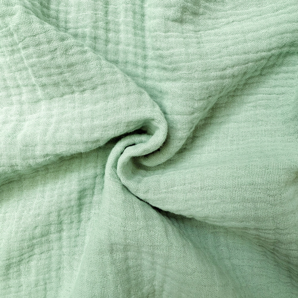 Sanfter, einfarbiger Musselin-Stoff in Hellgrün, weich und atmungsaktiv, ideal für Hausbett-Himmel im Kinderzimmer.