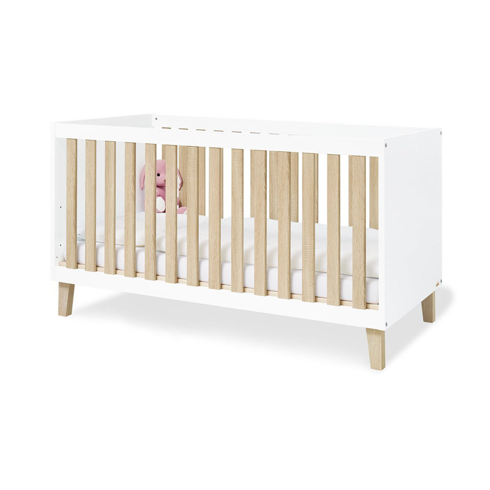 Modernes mitwachsendes Babybett aus der Babyzimmer Möbel Kollektion mit weißer Oberfläche und Naturholz-Akzenten für Kinderzimmer Neuware