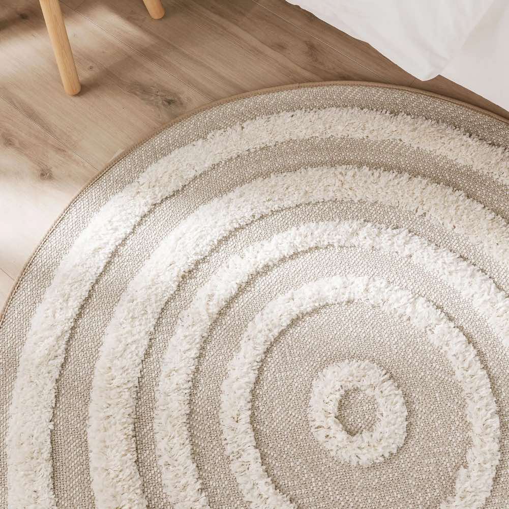 Runder Teppich in Creme fürs Kinderzimmer